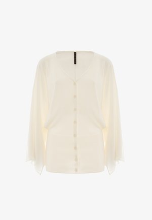 Cardigan di colore crema in tessuto leggero, con scollo a V, chiusura a bottoni e maniche a pipe con texture a coste all'orlo.