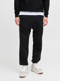 Jack & Jones JPSTKANE SOHO - Tracksuit bottoms - black