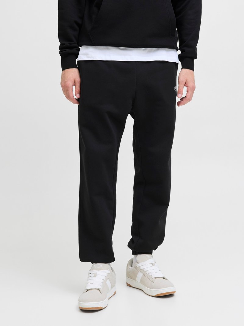 Jack & Jones JPSTKANE SOHO - Tracksuit bottoms - black