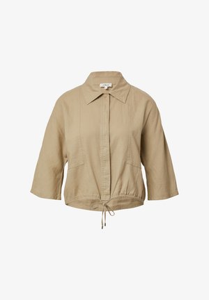 Beige cropped jack met een kraag, verstelbare touwtjes in de taille, korte mouwen en twee voorzakken. Gemaakt van lichte stof.