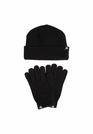 Black knitted beanie with a folded brim and logo accent; paired with black gloves featuring textured fingers and logo at the cuff.