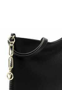 Black leather handbag with a textured surface, a rounded top, and a gold-tone chain link accent. Features includes a prominent logo charm.