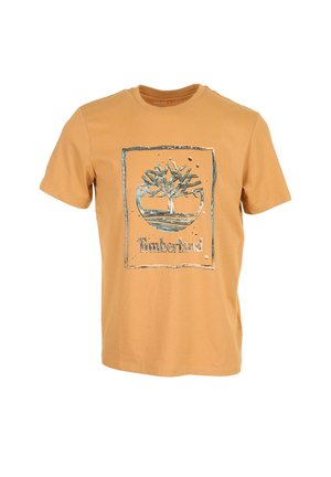 T-shirt arancione Timberland a maniche corte con grande logo metallico a forma di albero e nome del marchio stampati al centro anteriore.