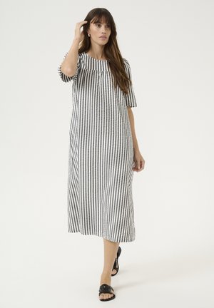 Striped midi dress in black and white fabric, with short sleeves and a loose fit. Features a gathered neckline and subtle texture.