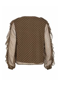 Blusa marrón con lunares y mangas transparentes con volantes, de corte relajado y escote redondeado, destacando una tela ligera.