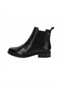 Bota de tobillo de cuero negro con paneles laterales elásticos, punta redonda y un tacón bajo. Presenta un lazo en la parte trasera para facilitar su uso.