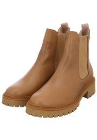 Tan leather Chelsea boots with elastic side panels, a rounded toe, and a textured rubber sole featuring a contrasting stitched detail.