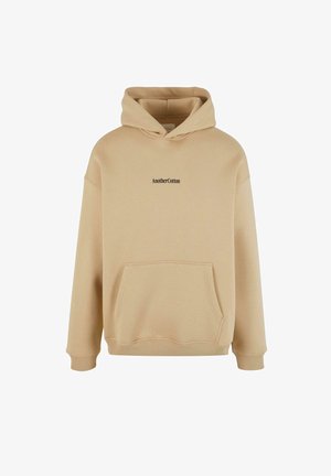 Bež dukserica s kapuljačom izrađena od mekog pamučnog materijala. Ima prednji kengur dzep i crni tekstualni logo "AnotherCotton" na prsima.