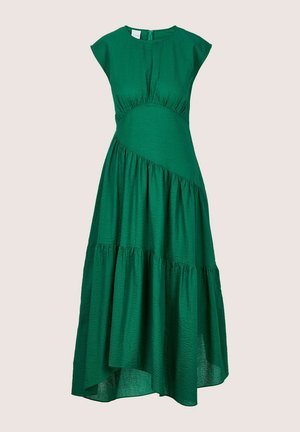Groene, gelaagde maxi-jurk van gestructureerde stof. Heeft kapmouwtjes, een aangesloten lijfje en een asymmetrische zoom.