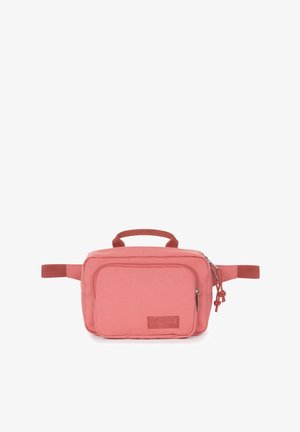 Różowa torba materiałowa o prostokątnym kształcie, z górnym uchwytem, przednią kieszenią na zamek i bocznymi pętlami z taśmy. Teksturowana powierzchnia z naszywką marki.