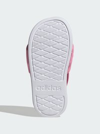 Λευκή εξωτερική σόλα από καουτσούκ με υφή για καλύτερη πρόσφυση, που διαθέτει το ανάγλυφο λογότυπο "adidas". Το επάνω μέρος εμφανίζει ροζ πλευρά χωρίς ορατές ραφές.