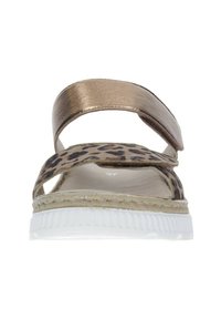 Leopard print sandal with a bronze metallic strap, white outsole, and jute detailing. Features two adjustable straps for secure fit.