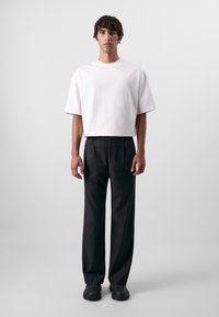 Don't Waste Culture - ORO UNISEX - Trousers - black Thumbnail Image 1