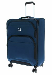 Valigia in tessuto blu con manico retrattile, due grandi zip frontali, accenti neri e quattro ruote multidirezionali per una facile mobilità.
