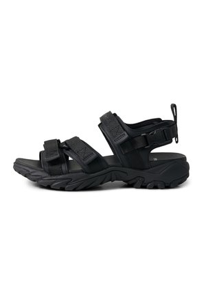 Black outdoor sandal with rugged sole, adjustable hook-and-loop straps across toes, midfoot, and ankle, and a pull tab at heel.