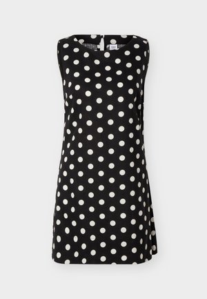 Robe noire sans manches à pois blancs, col rond, avec une petite fermeture à boutons dans le dos, présentée sur un fond uni.