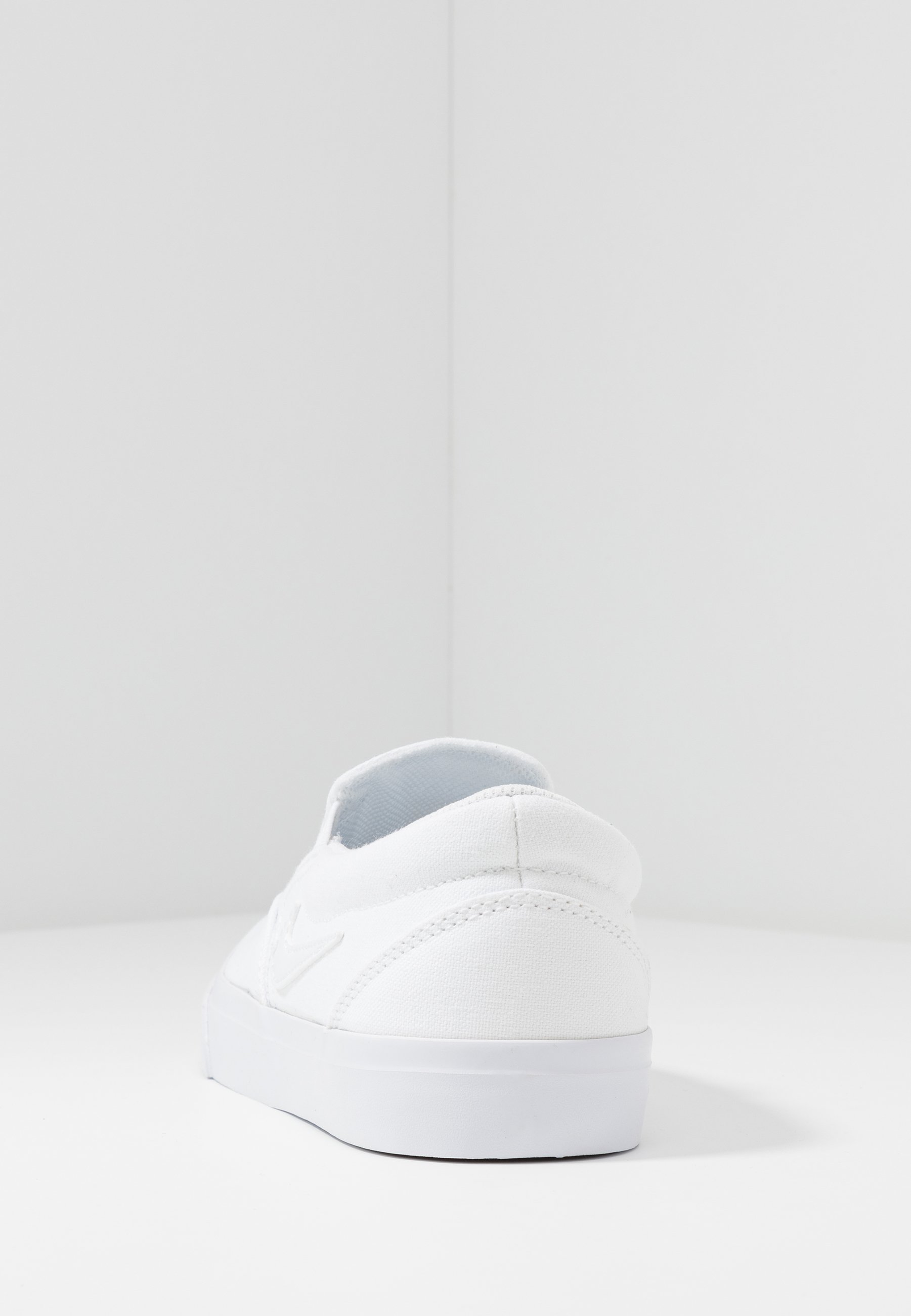 nike white slip ons