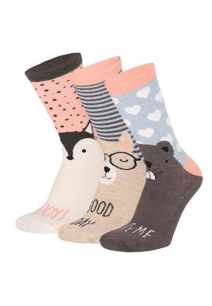 Drei bunte Socken mit Tiergesichtern: Pinguin auf Pink mit schwarzen Punkten, Katze mit Brille auf grauen Streifen und Biber auf Blau mit weißen Herzen.