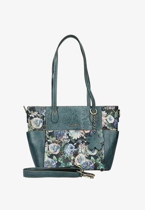 Türkistote mit floralen Stoffpaneelen, zwei Schulterriemen, einem abnehmbaren längeren Riemen und einem blumenförmigen Anhänger, der an einem Ring hängt.