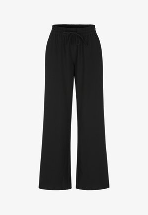 Zwarte wijde broek van zacht materiaal, met een elastische tailleband en een verstelbaar trekkoord. Eenvoudig ontwerp zonder zichtbare patronen.