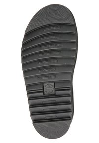 Suola di scarpa in gomma nera con righe orizzontali per la trazione, dotata di una superficie texturizzata e dettaglio del logo centrale.