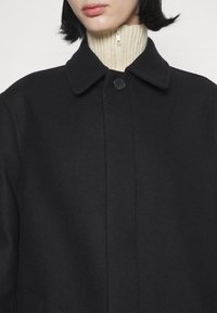 Filippa K Abrigo clásico - black