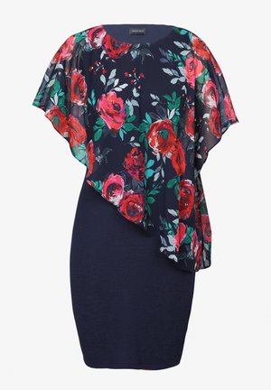 Vestido floral con base azul marino, que presenta una superposición floral transparente en tonos rojos y rosas. La tela es suave, con un cuerpo texturizado y mangas fluidas.