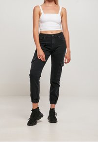 Urban Classics Džíny Relaxed Fit - black