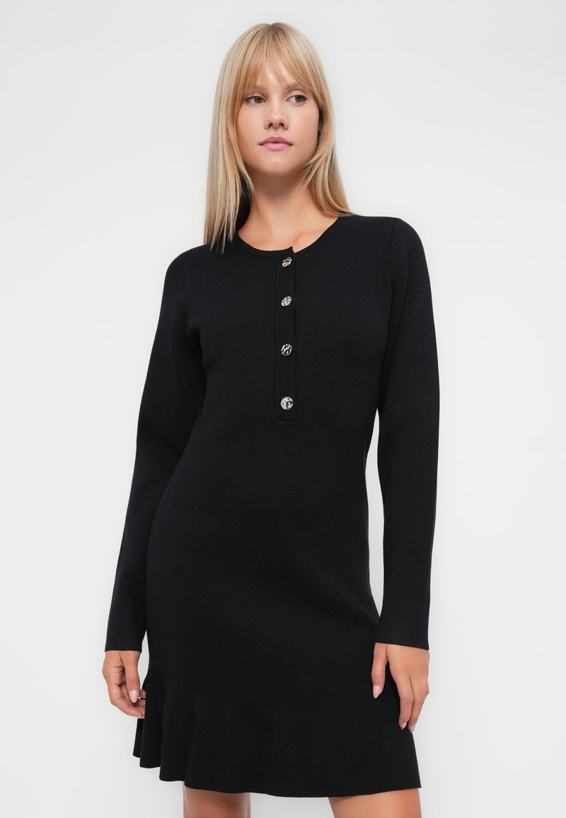 Vila Curve tie waist high neck knitted mini dress in black
