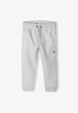 Graue Baumwoll-Sweatpants mit elastischem Bund und Kordelzug. Sie verfügen über zwei Seitentaschen und ein kleines schwarzes Hirsch-Logo am linken Oberschenkel.