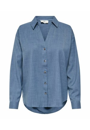 Blouse bleue à manches longues avec boutons, col et ourlet arrondi, fabriquée en tissu texturé léger.