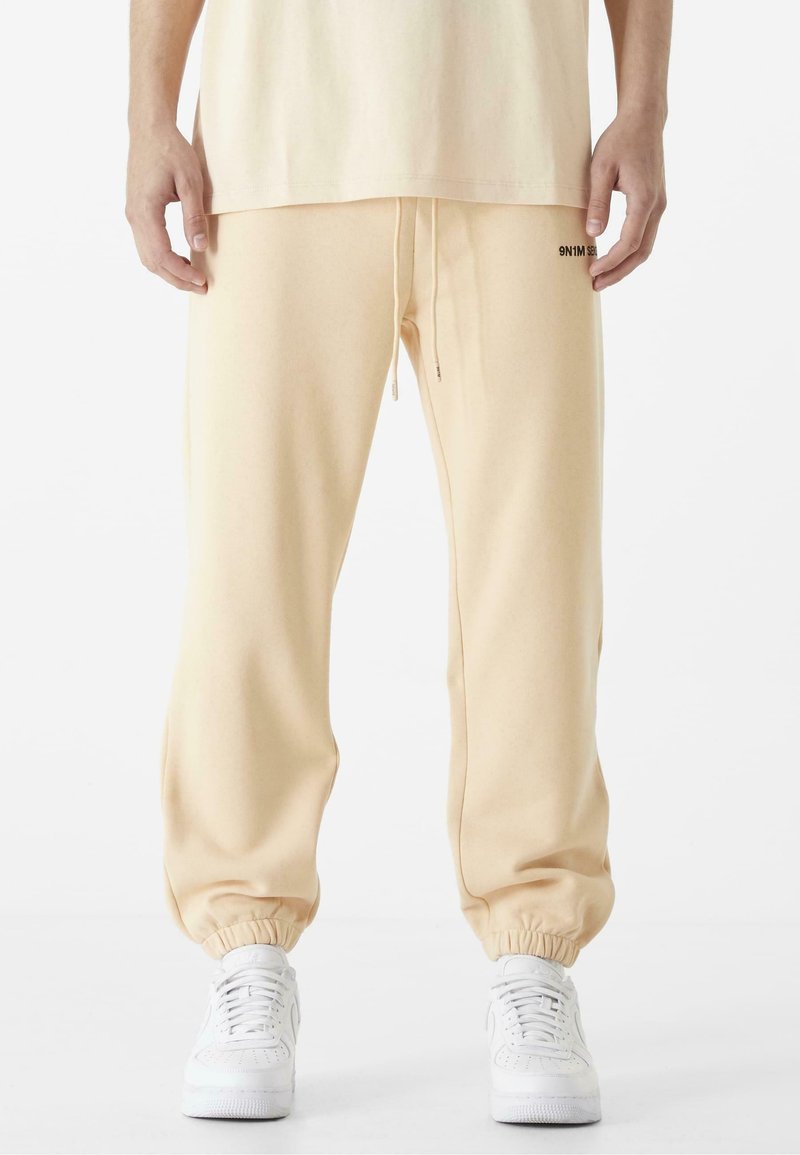 9N1M SENSE ESSENTIAL - Jogginghose - vanille