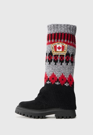 Μαύρη σουέτ μπότες με υφασμάτινο πόδι σε ανάγλυφο γκρι, κόκκινο και μαύρο. Περιλαμβάνει λογότυπο, ριμπ κορυφή και χοντρή, ανθεκτική σόλα.