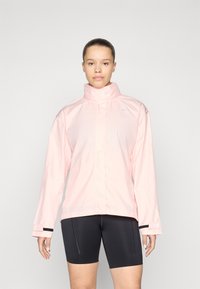 Light pink waterproof jacket with a high collar and long sleeves. Features black accents on cuffs and a small logo on the upper left.
