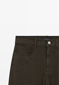 Dark green cotton blend pants with a straight-leg design. Features include a front button closure, belt loops, and side pockets.