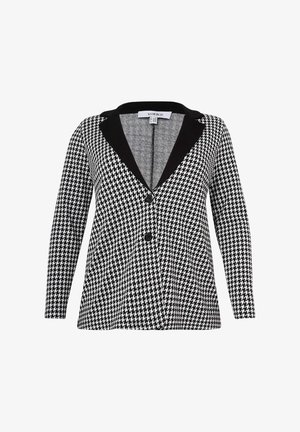 Black and white houndstooth patterned blazer with a black lapel, long sleeves, and two front pockets. Features a button closure.