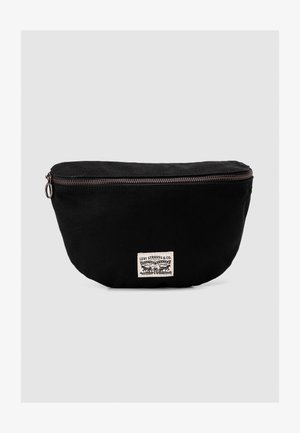 Sacoche Levi's en toile noire avec fermeture éclair en bronze et étiquette avant arborant le logo et le design d'un cheval croisé.