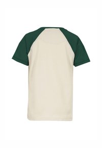 T-paita lyhyillä hihoilla, jossa vaalea beige vartalo ja tummanvihreät raglan-hihat. Valmistettu pehmeästä kankaasta, jossa on pyöreä pääntie ja tasaiset saumat.