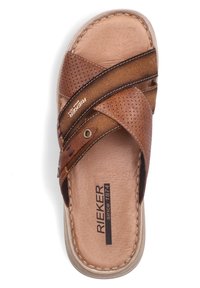 Sandale en cuir marron avec des bretelles croisées, des détails perforés, une semelle intérieure douce et un logo imprimé sur le pied. Semelle extérieure en caoutchouc durable.