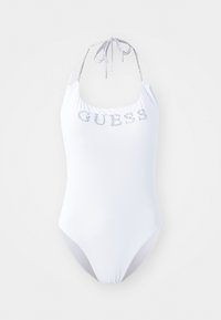 Maillot de bain une pièce blanc avec un lien autour du cou, présentant "GUESS" en strass sur le devant et une finition lisse et texturée.