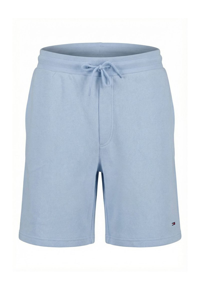 Short bleu clair longueur genou avec taille élastique et cordon, confectionné dans un tissu doux, avec un petit logo sur l'ourlet de la jambe gauche.
