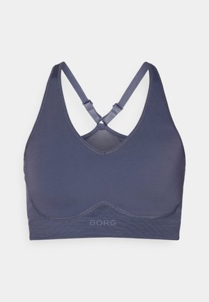 Sutien sport de culoare bleu marin, realizat dintr-un material elastic, cu decolteu în V, bretele crisscross și un logo discret în partea de jos. Textură netedă.