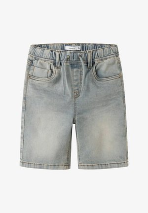 Svetlo modri denim kratke hlače z elastičnim pasom, vrvico za zavezovanje, sprednjimi žepi in zankami za pas, namenjene otrokom velikosti 6 let.