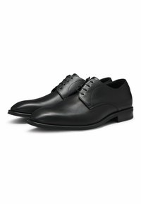 Black leather dress shoes with a polished finish, pointed toe, and lace-up design. Features a slightly raised heel and smooth texture.