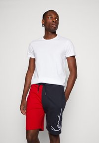 Karl Kani SIGNATURE BLOCK UNISEX - Shorts - multicolor