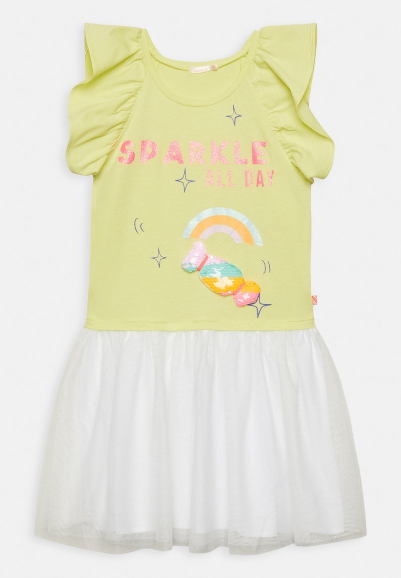 Zeleno-limetková šaty s krátkými balónovými rukávy a bílou tylovou sukní. Na přední straně je nápis "ZÁŘIT CELÝ DEN" vytištěný s lesklými detaily a duhovým vzorem.