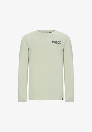 Jasnozielona, długosleeve t-shirt wykonany z miękkiego materiału. Ma okrągły dekolt i czarny nadruk na klatce piersiowej. Prosty design bez wzorów.