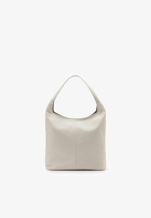 Borsa a tracolla in pelle grigio chiaro morbido con una singola tracolla e design minimalista, in piedi su sfondo bianco.