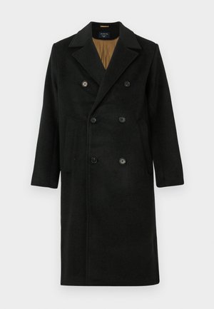 Zwarte double-breasted wollen jas met een reverskraag, grote knopen en zijzakken; voorzien van een contrasterende voering.
