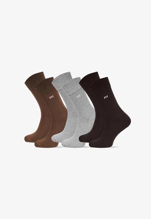 Cztery pary skarpetek w kolorach brązowym, szarym i czarnym. Każda z nich ma ściągacz i małe logo z boku. Wykonane z miękkiego materiału.